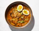 This image released by Milk Street shows a miso, shiitake mushroom and kimchi soup.