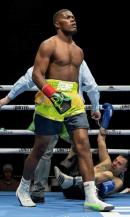 Jamaica’s Jerone ‘Beast’ Ennis walks to his corner after putting Argentinian Marcelo Adrian Fernandez on the canvas during their four-round  light-heavyweight fight at the Pickering Casino Resort in Ontario, Canada last Saturday.