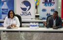 Tamar McKenzie (left), president of the Jamaica Independent School Association (JISA), listens to Councillor Richard Vernon, mayor of Montego Bay, while he endorses the return of JISA Western Track and Field Meet to the athletics calendar in Western Jamaic