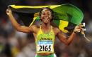 In this 2008 photo, Shelly-Ann Fraser-Pryce celebrates after winning the 100-metre gold at Beijing Olympics.