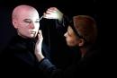 In this undated handout photo provided by The National Wax Museum Plus, Artistic Coordinator Mel Creek applies the finishing touches on a wax figure of the late singer Sinead O’Connor, at the National Wax Museum Plus on Dublin’s Westmorland Street, Ire